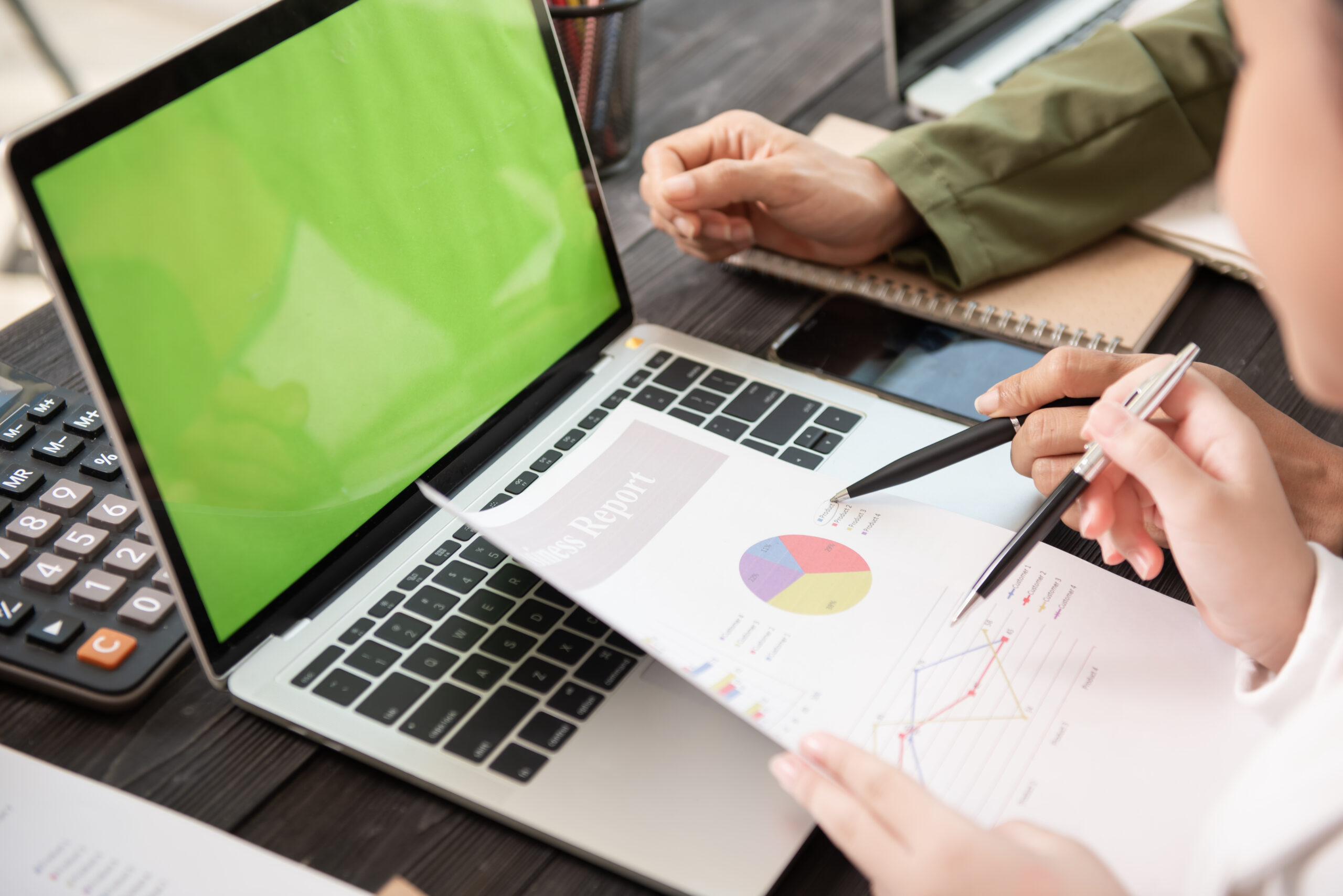 Business people meeting at office writing memos on sticky notes. Marketeer India PPC services